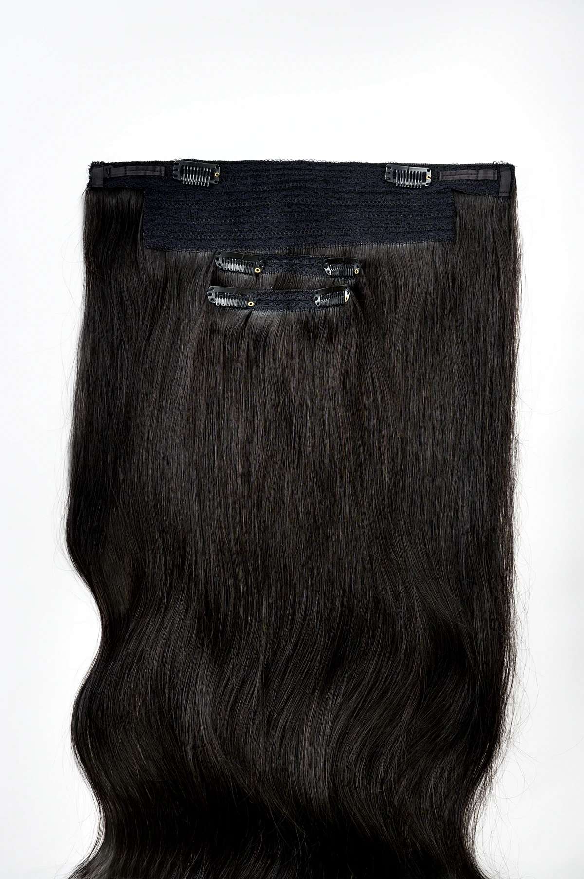 rollover-image. Classic halo hair extensions instantly add length and volume with a weft secured with invisible miracle wire that is placed on the crown of your head. You can choose from 6 different sized nylon wires to ensure a perfect, comfortable fit. Secure and blend your halo hair extensions with 2 clip in extensions for a quick complete look. Superior Hair