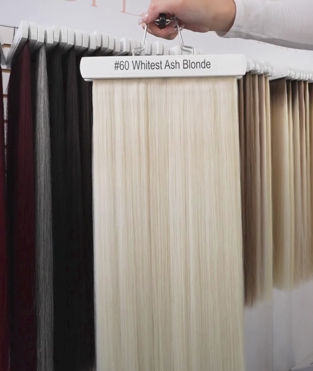 Load video: #60 Whitest Ash Blonde Classic Halo Hair Extensions