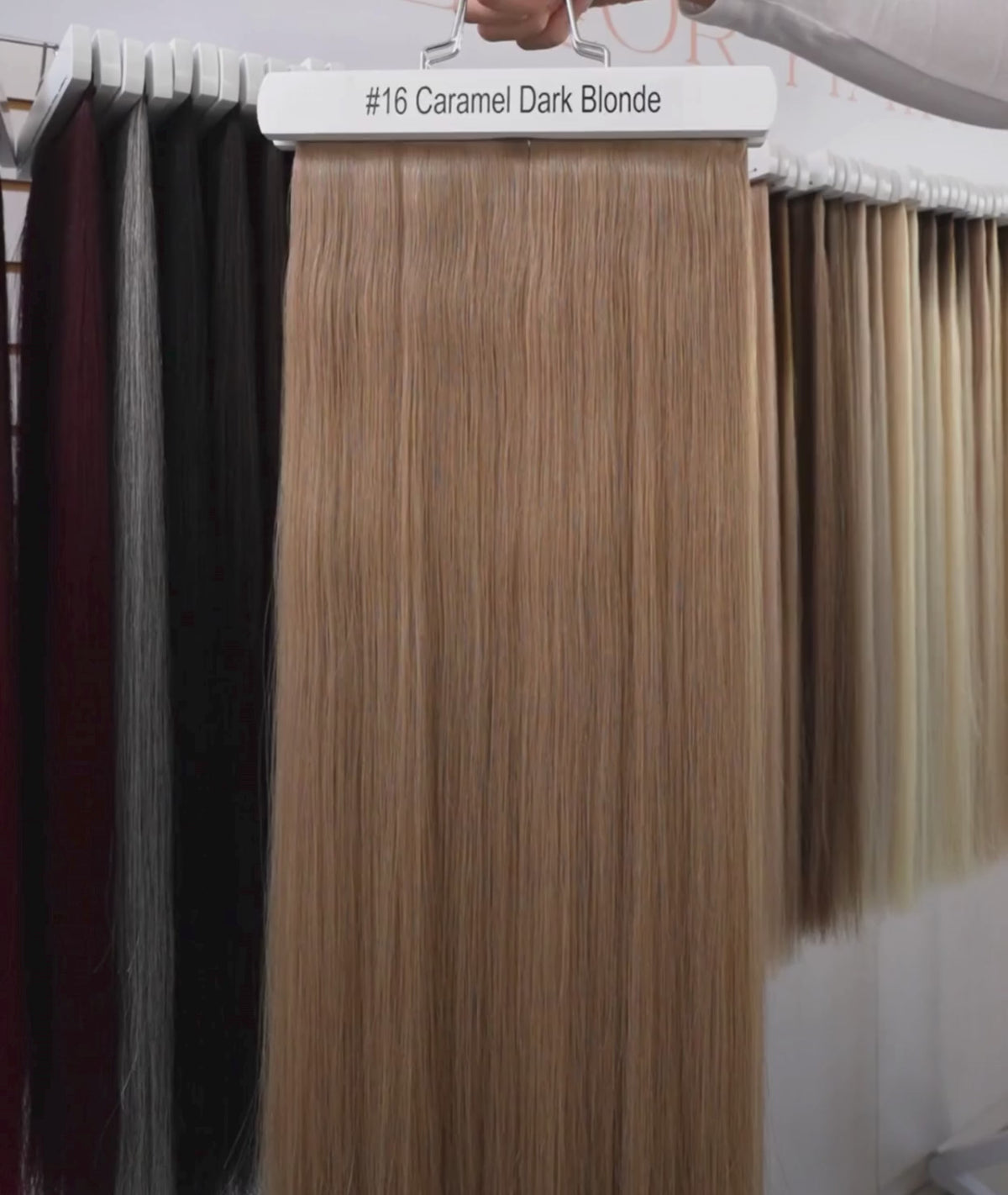 Load video: #16 Caramel Dark Blonde Invisi Tape Hair Extensions